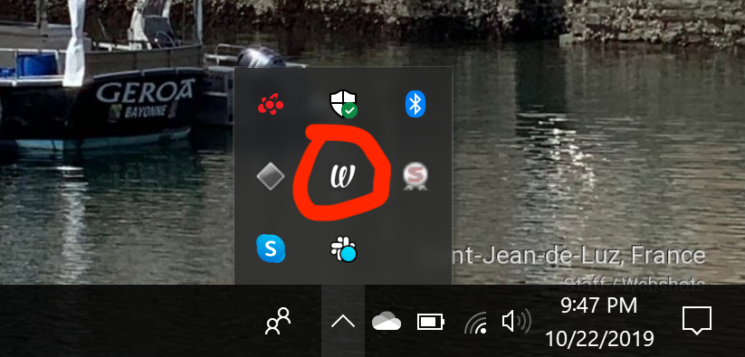 Then right click on the Webshots icon shown here and select "Exit"